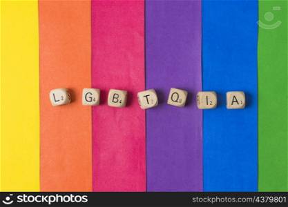lgbtqia word cubes gay flag