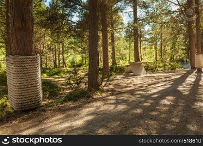 Liasanden rest stop area in pine forest, Leirdalen Lom municipality, Norway. National tourist route 55 Sognefjellet. Holidays relaxation on trip.. Liasanden rest area. Norwegian route Sognefjellet