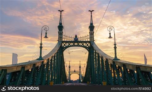 Liberty Bridge in Budapest at cloudy sunrise. Liberty Bridge at sunrise