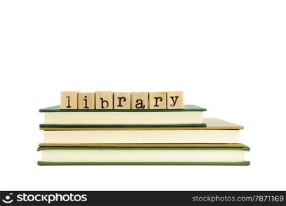 library word on wood stamps stack on books, reading and research concept