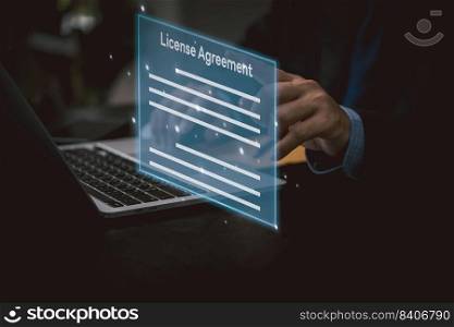 licensing agreement application online Information concept. Businessperson using laptop.