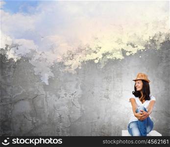 Life concepts. Young pretty lady in hat dreaming about future
