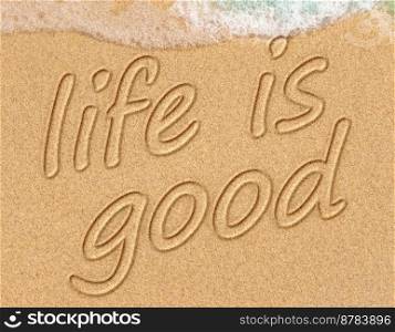 Life is good on a beach text positive thinking concept