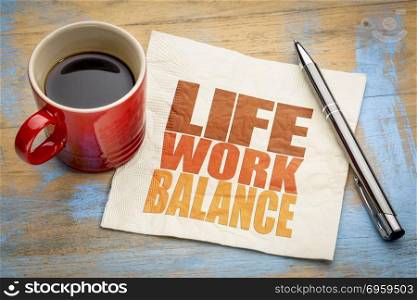 life work balance concept on napkin. life work balance concept - word abstract on a napkin with a cup of coffee