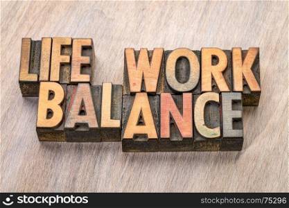 life work balance - word abstract in vintage letterpress wood type printing blocks