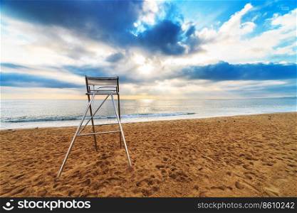 lifeguard chair on an empty beach