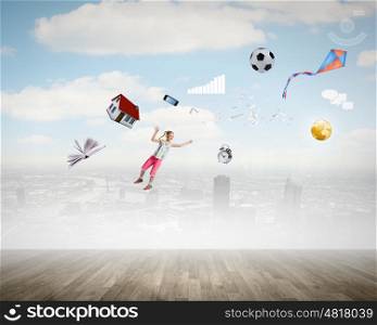 Lifestyle concept. Background image with flying kid and items
