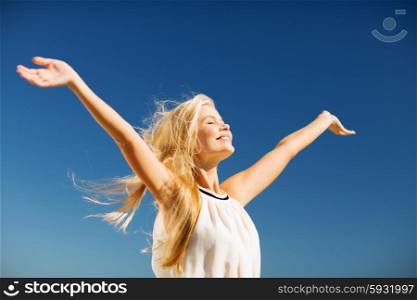lifestyle concept - beautiful happy woman enjoying summer outdoors. beautiful woman enjoying summer outdoors