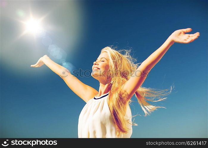 lifestyle concept - beautiful happy woman enjoying summer outdoors. beautiful woman enjoying summer outdoors