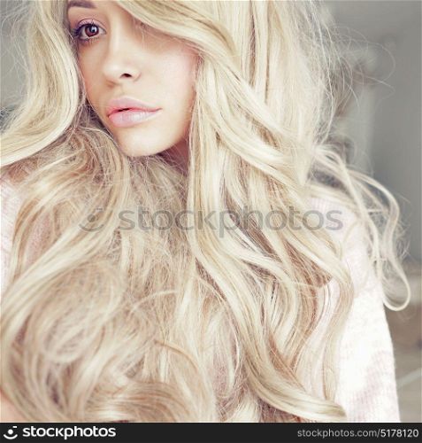 Lifestyle photo of beautiful blonde woman. Calm, harmony and beauty