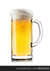 Light beer with the foam in mug isolated on a white background. Light beer with the foam in mug