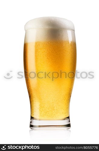 Light beer with the foam poured into glass isolated on white background. Light beer with the foam poured into glass