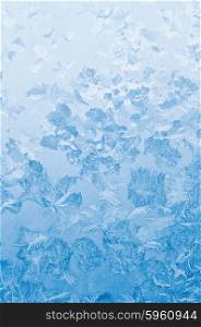 Light blue frozen window glass background
