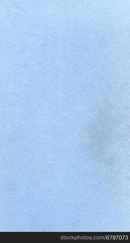 Light blue paper texture background - vertical. Light blue paper texture useful as a background - vertical