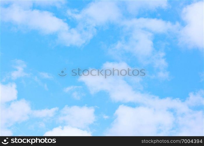 Light blue sky and clouds - background
