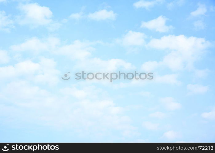 Light blue sky with clouds, may be used as background