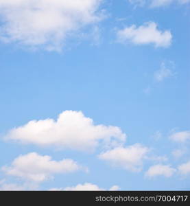 Light blue spring sky with clouds. Background, space for your own text