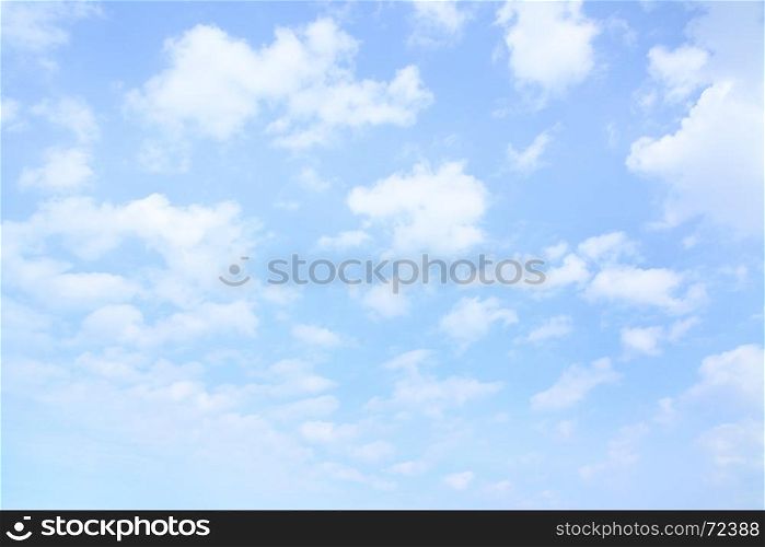 Light blue spring sky with clouds, may be used as background
