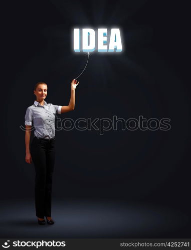 Light bulb and a business person as symbols of creativity in business