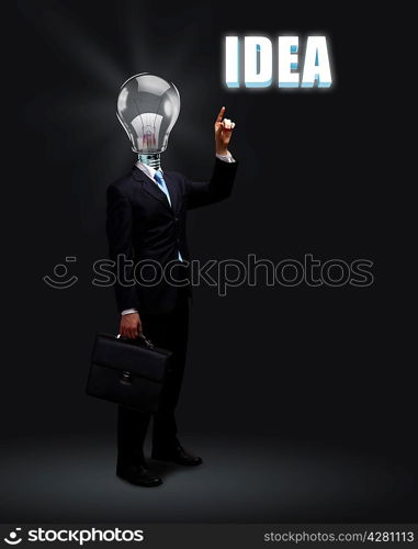 Light bulb and a business person as symbols of creativity in business