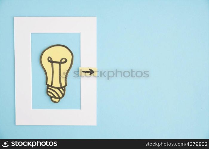 light bulb frame with directional arrow blue background