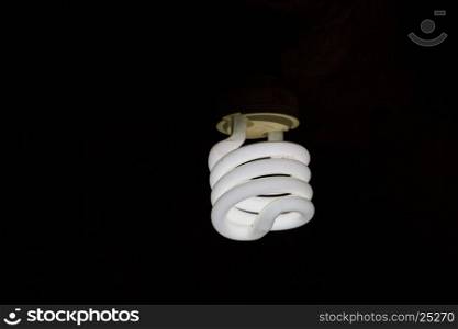 Light bulb lamps on black colour background