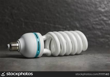 light bulb led , light from the lamp on dark background / energy saving idea , power saving concept