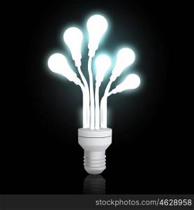 Light bulb. Light bulb shiny rendered on black bakground