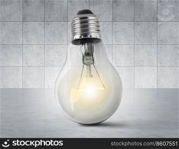 Light bulb on concrete room floor