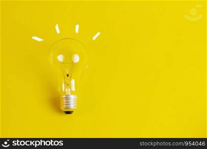 Light bulb with concept drawing New ideas, soft focus