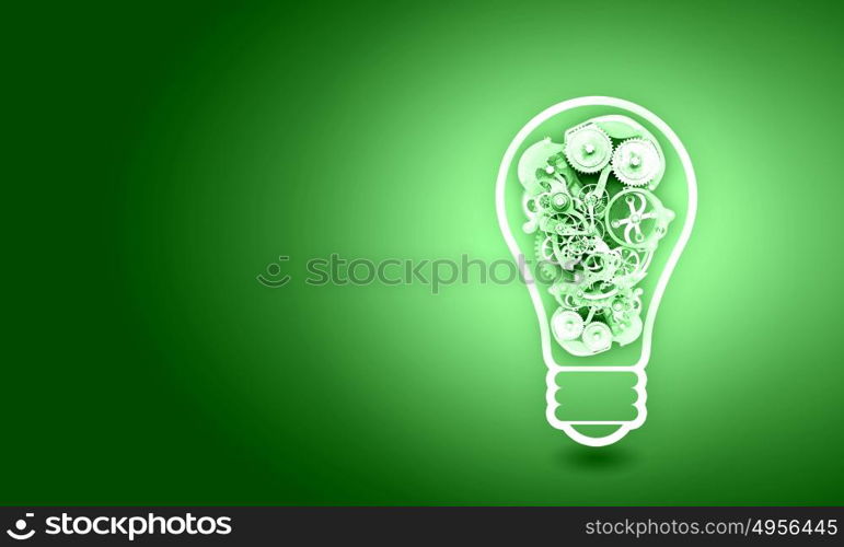 Light bulb with gears. Conceptual image with light bulb filled with gears