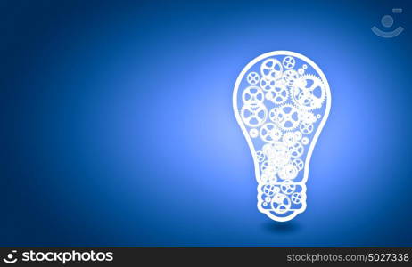 Light bulb with gears. Conceptual image with light bulb filled with gears