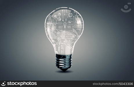 Light bulb with gears. Conceptual image with light bulb filled with gears