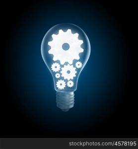 Light bulb with gears. Light bulb concept with gears inside on dark background