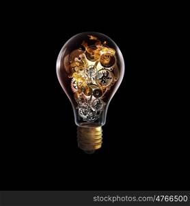 Light bulb with gears. Light bulb concept with gears inside on dark background