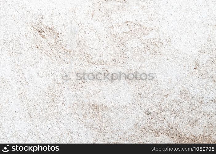 Light coloured tone dirty rough grungy ruin textured old concrete wall background wallpaper