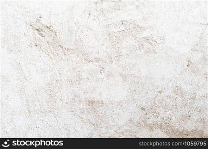 Light coloured tone dirty rough grungy ruin textured old concrete wall background wallpaper