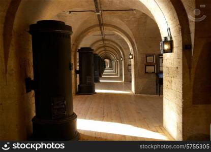 Light corridor made of old yellow stone