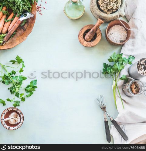 Light food background with vintage tools, forks, spices and kitchen herbst. Top view. Copy space. Frame