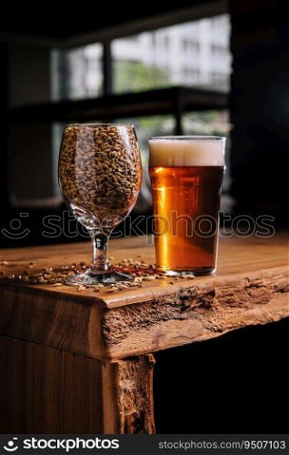 Light golden beer on wooden table