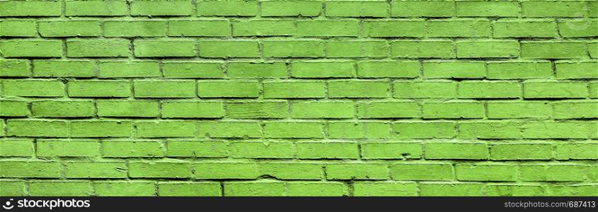 Light green Brick wall texture close up. Top view. Modern brick wall wallpaper design for web or graphic art projects. Abstract background for business cards and covers. Template or mock up.. Green Brick wall texture close up.