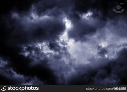 Light in the Dark and Dramatic Storm Clouds