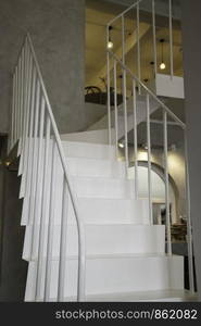 Light interior living room with staircase, stock photo