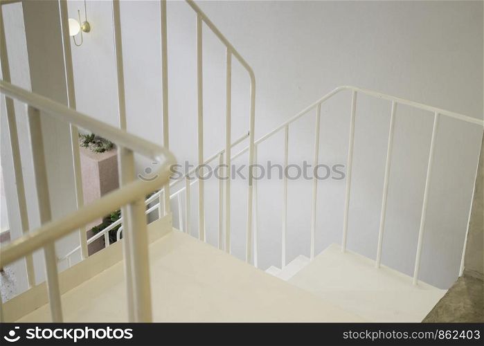 Light interior living room with staircase, stock photo