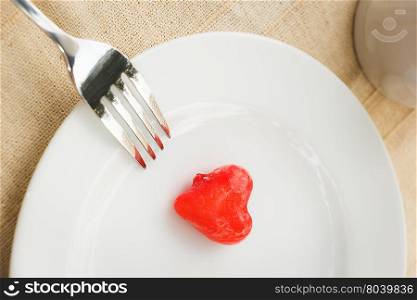 Light meal with close up of sweet food or deletable imitation fruits (heart shape)