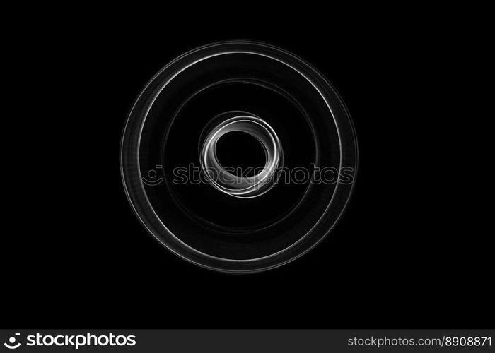 Light painted glowing abstract black and white curved lines on a black background