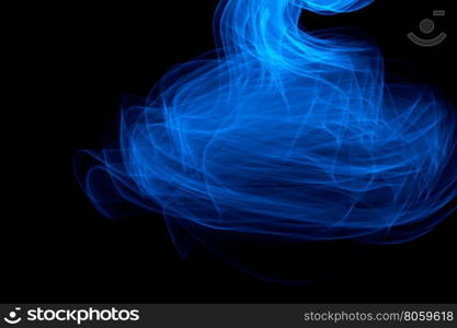 Light painted glowing abstract blue curved lines on a black background