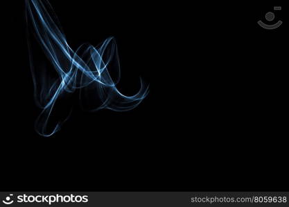 Light painted glowing abstract light blue and white curved lines on a black background