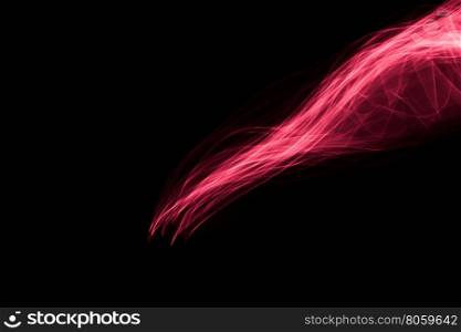 Light painted glowing abstract light red and pink curved lines on a black background