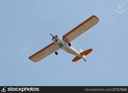 Light plane flying overhead, Palo Alto Airport, California